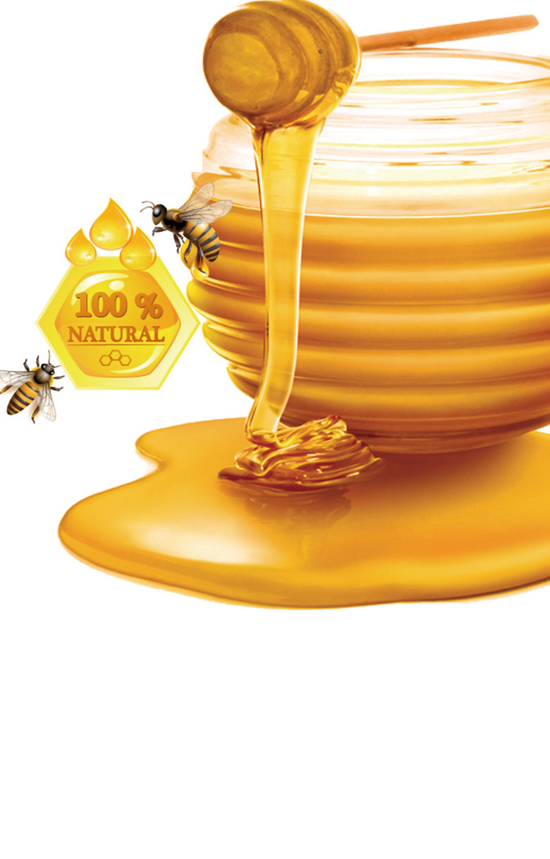 金黄色蜜罐旁的蜜蜂背景素材
