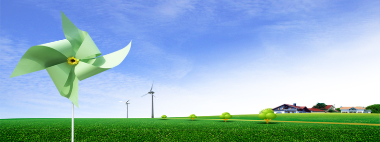草地上的绿色纸风车背景